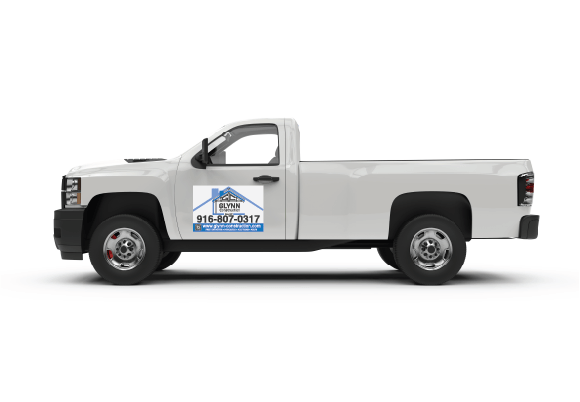 White truck with Glenn Construction Magnet